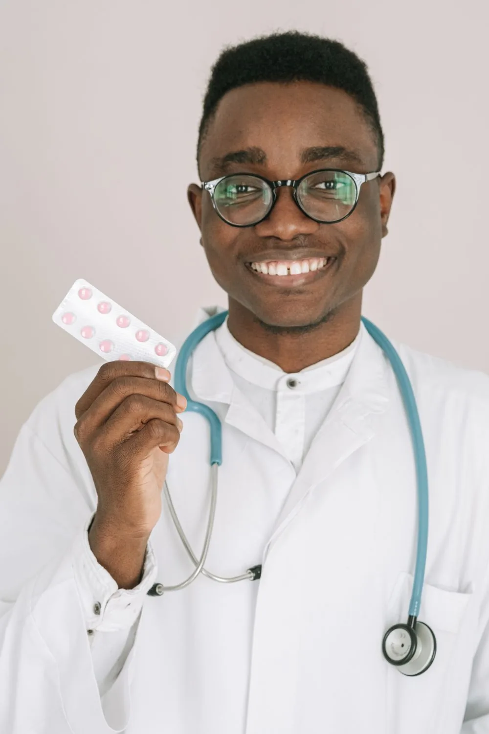 Pharmacist handling a prescription transfer