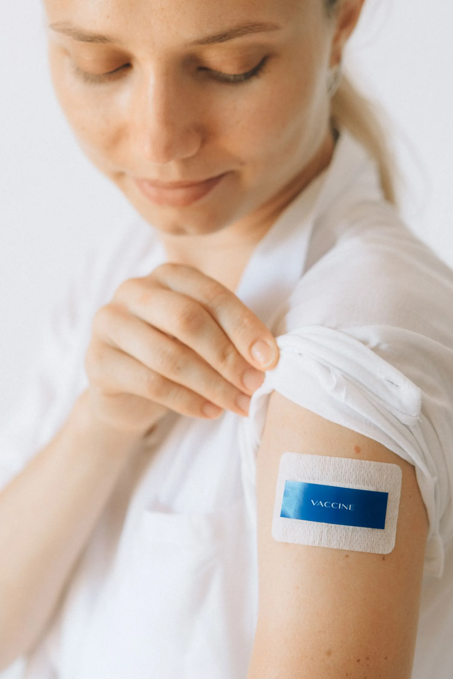 Patient with bandage after a vaccine